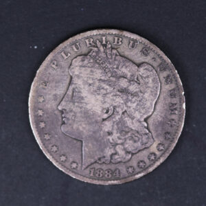 1884-CC Morgan Silver Dollar. Very Good Circulated Coin. Store #07740