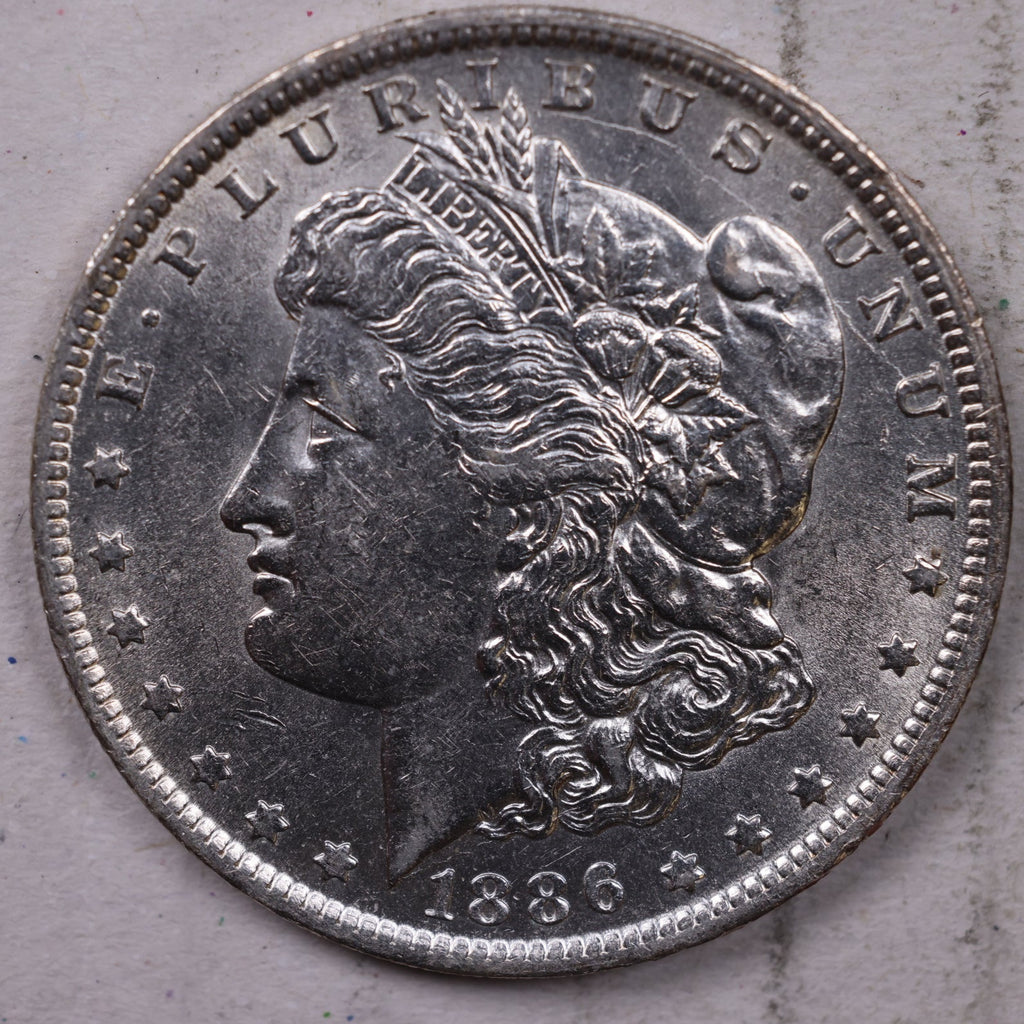 1886-O Morgan Silver Dollar, AU +., 'SLIDER'., Store Sale #501